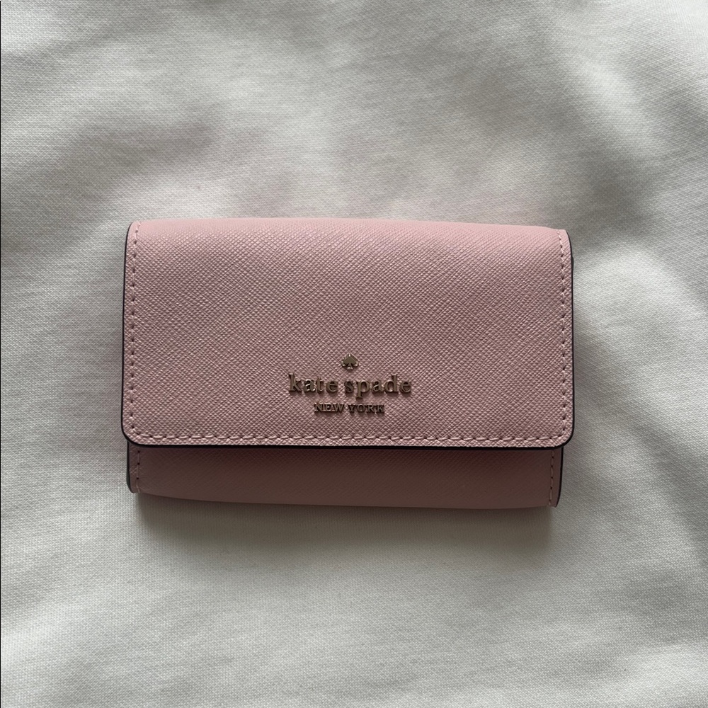 kate spade pale pink saffiano tri-fold wallet with gold logo